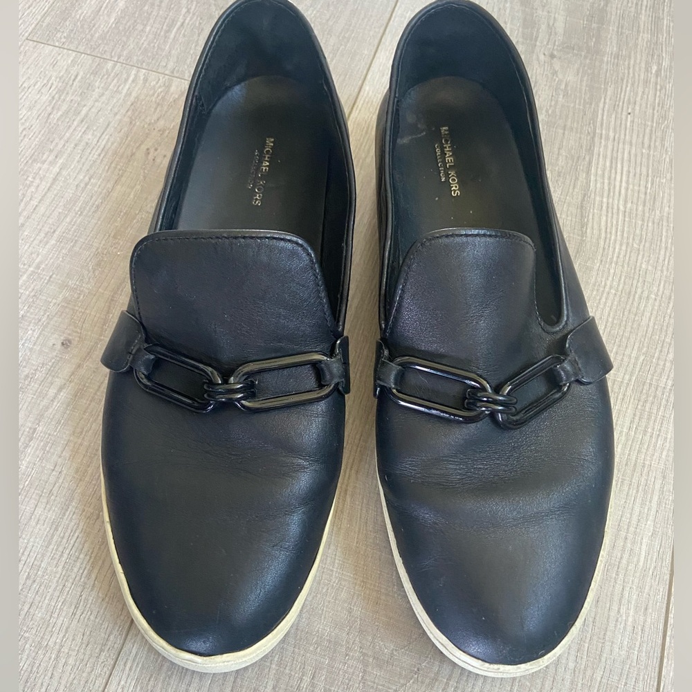 Michael Kors Black Leather woman’s  Slip-Ons size 39.5/9 black chain accent